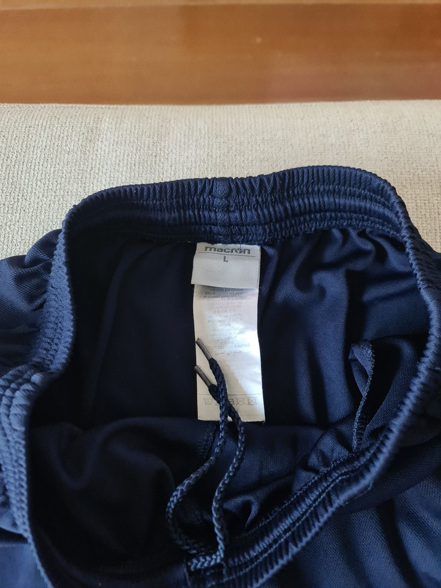 Calções Macron com bolsos