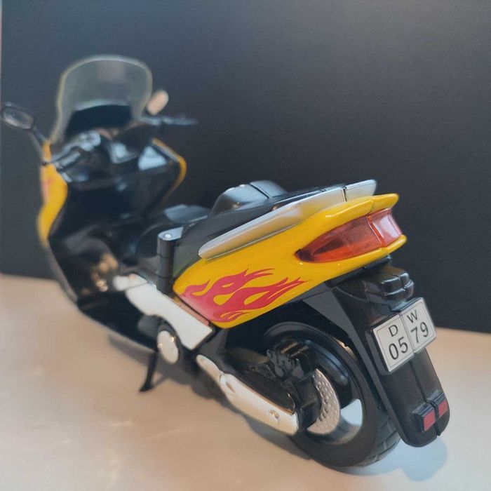 Іграшка скутер / мотоцикл (19 х 10 см), пластик