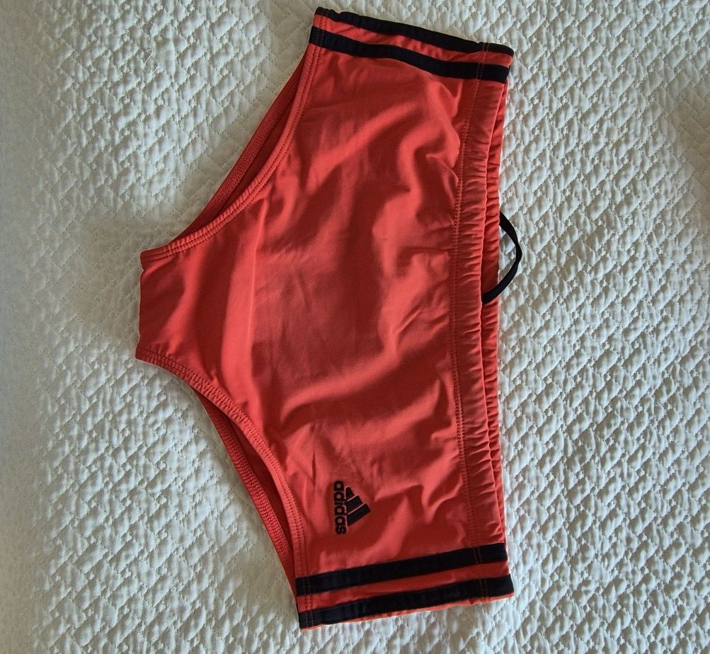 Slip de banho Adidas 3 Stripes laranja.