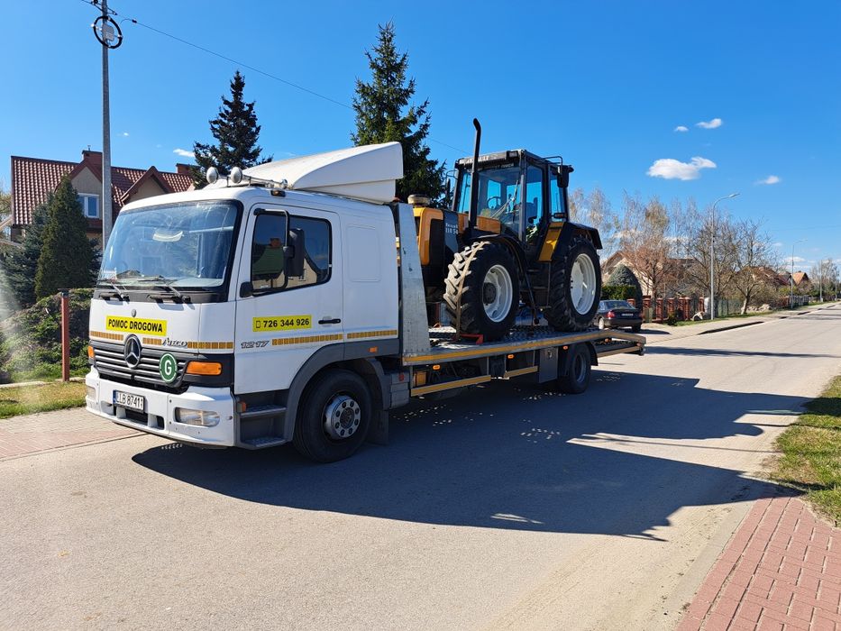 Pomoc drogowa Michòw laweta transport usługi holowanie 24h