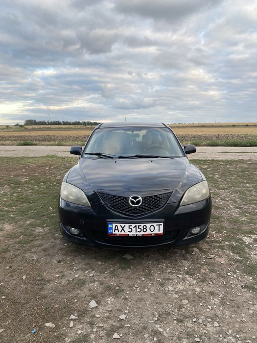 Мазда 3
