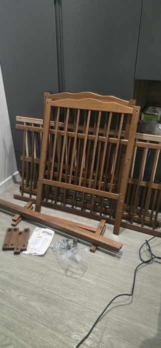 Дитяче ліжечко, маятниковий механізм