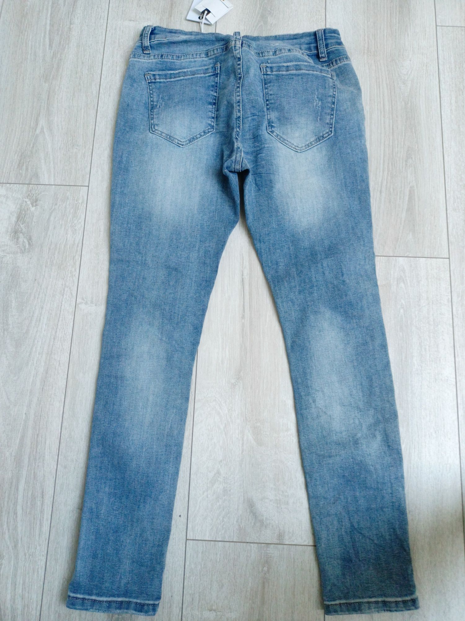 Nowe jeansy z metką M