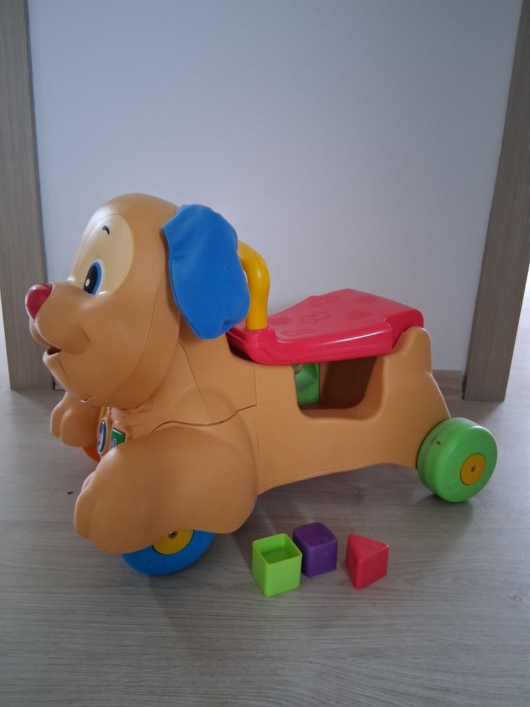 Piesek jeździk Fisher Price