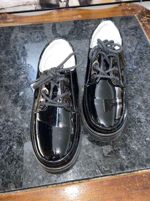 Sapatos de vela de criança