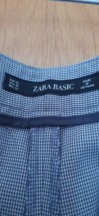 Calças modelo de fato em tecido pied de poule da Zara