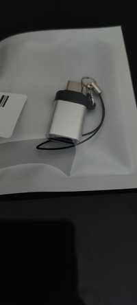 Adaptador USB para telemóvel