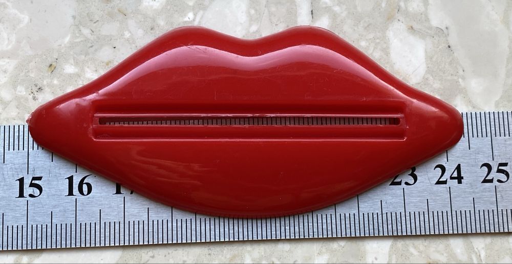 Wyciskacz Usta do pasty do zębów / do tubek z kremem