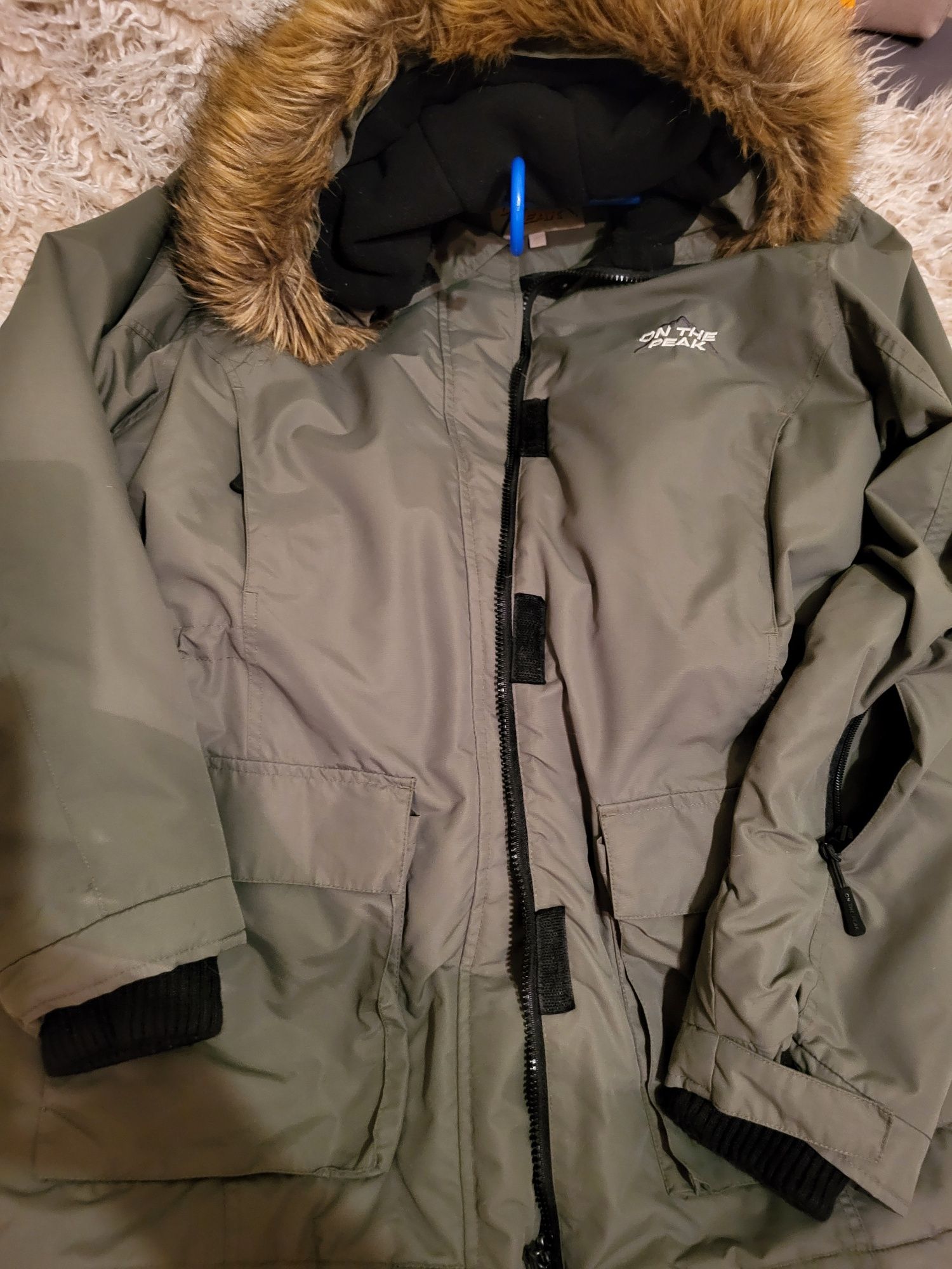 Khaki parka On The Peak