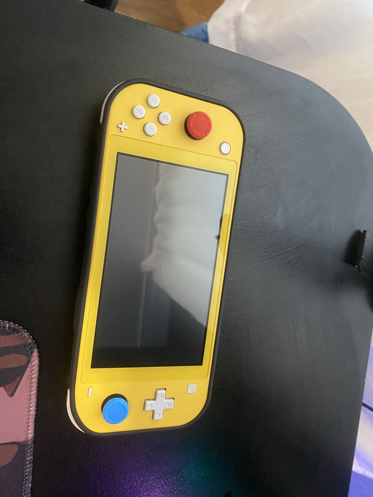 Nintendo Switch Lite + гра Zelda + чохол