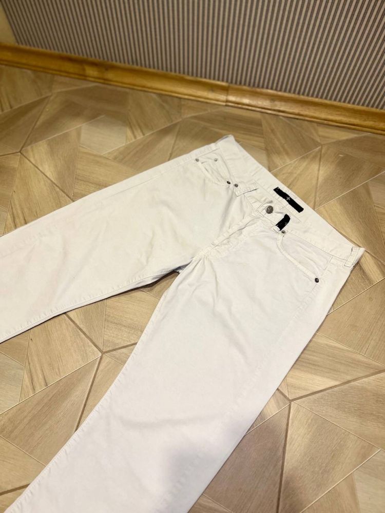 Білі вінтажні штани Stone Island