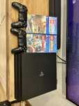Ps 4 pro 1tb +2 pady +4 gry