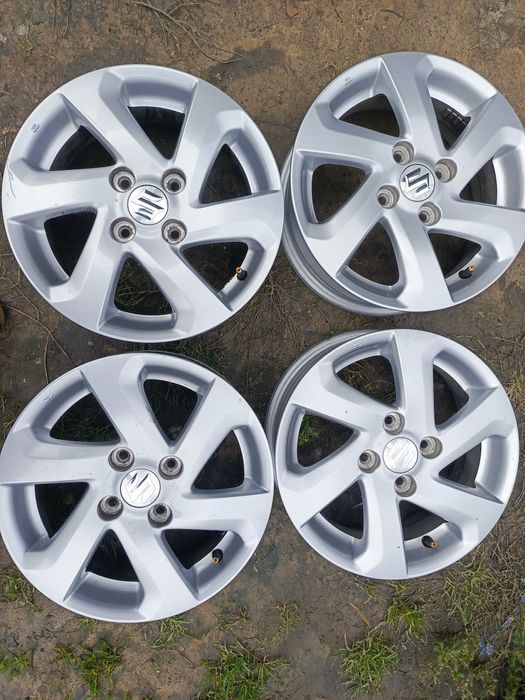 Sprzedam oryginalne alufelgi do Suzuki 4x100 r14
