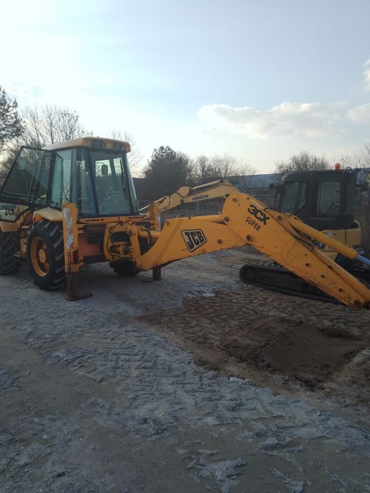 Usługi koparko-ładowarką wykopy prace ziemne rozbiórki