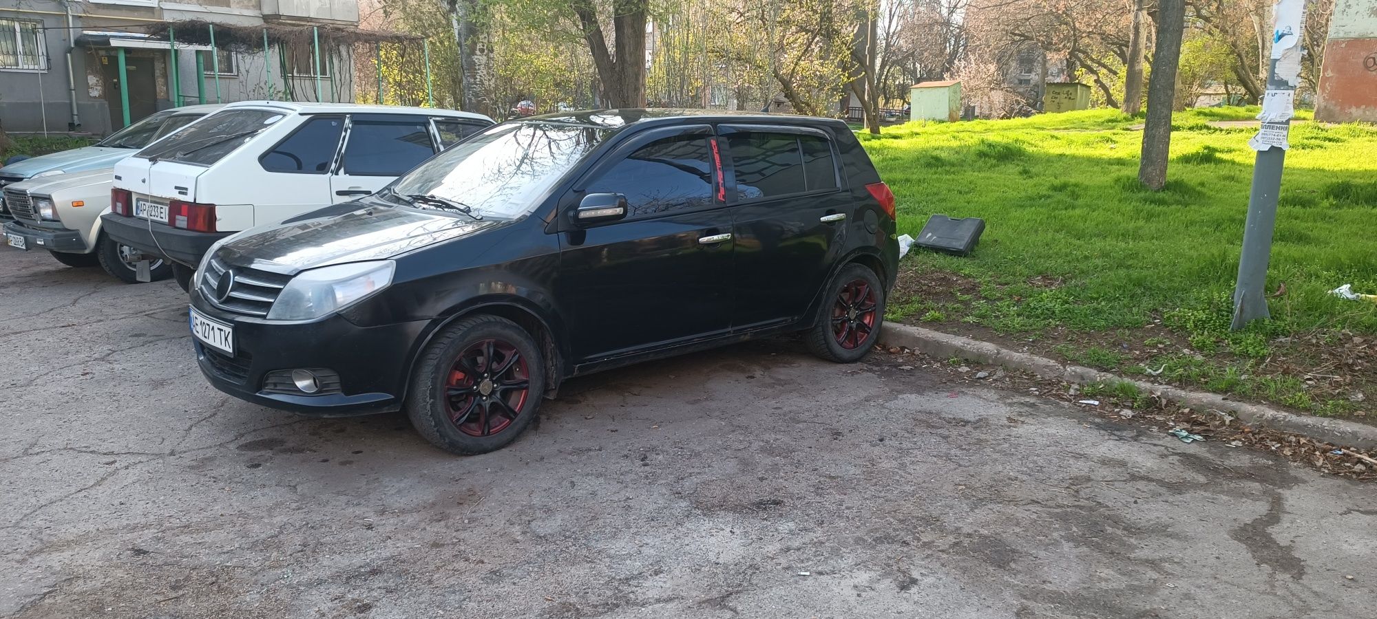 Машина Geely MK cross