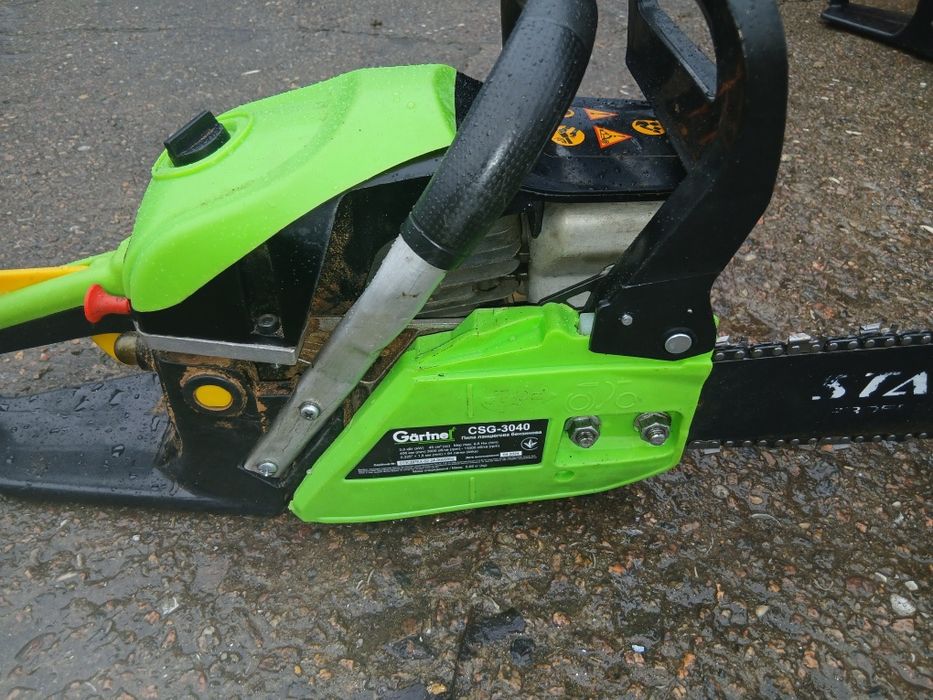 Бензопила с шиной и цепкой