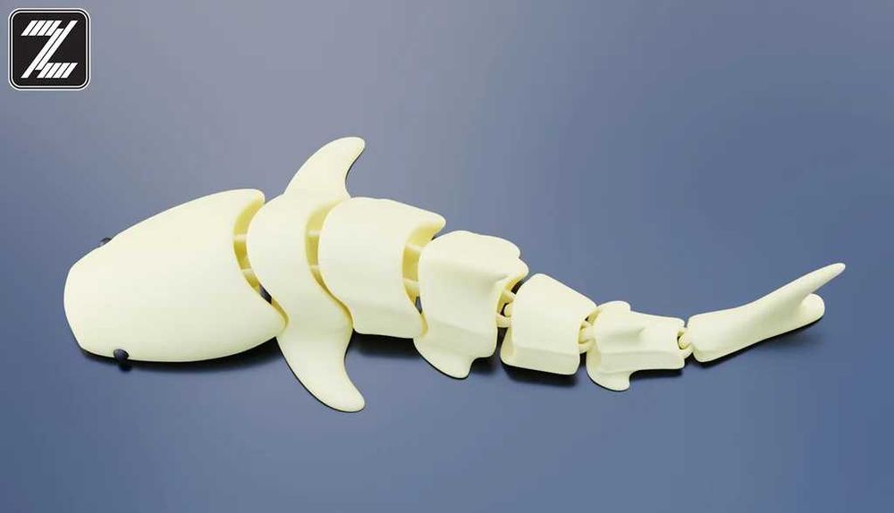 Подвижная игрушка в виде акулы