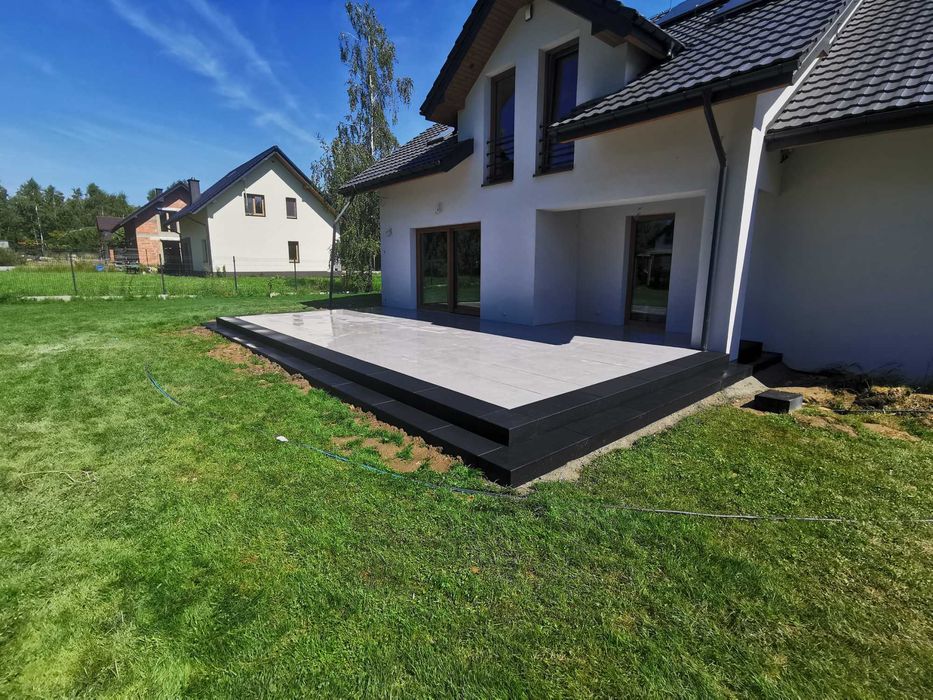 Brukarstwo Układanie kostki brukowej.