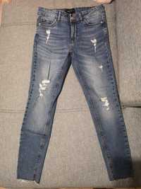 Spodnie damskie jeansy z przetarciami Mohito r. 34 XS
