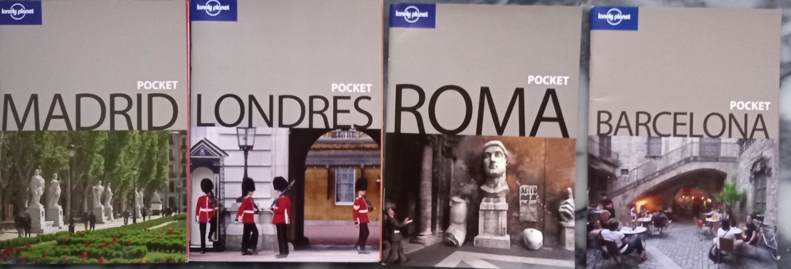 quatro mini livros Lonely Planet  Barcelona, Roma, Madrid e Londres