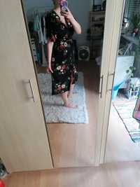 Sukienka midi w kwiaty wiązana w talii Reserved L podszewka kieszenie