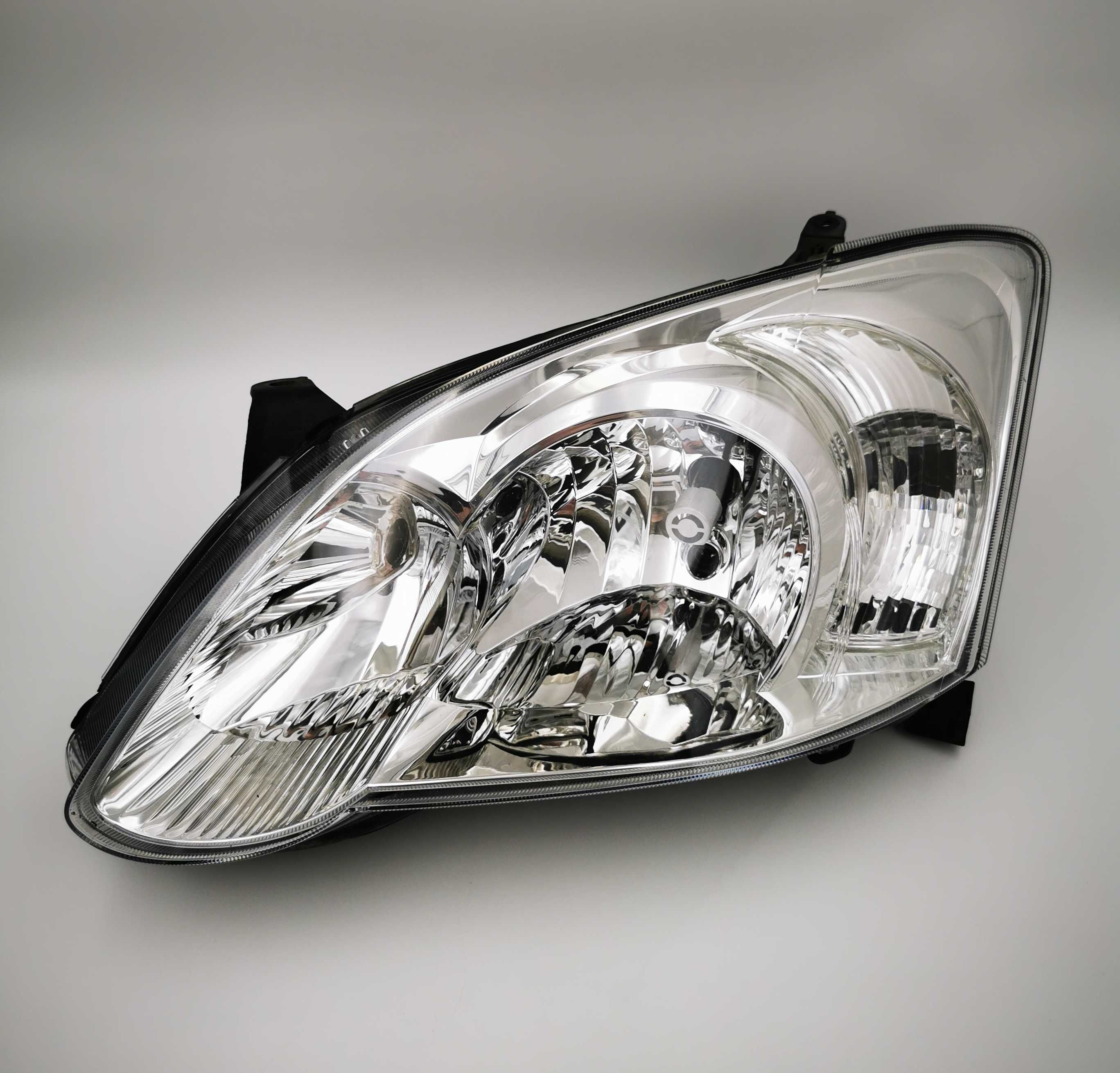 TOYOTA COROLLA E12 IX Lift 04-07 Lampa Przednia Lewa Reflektor EUROPA