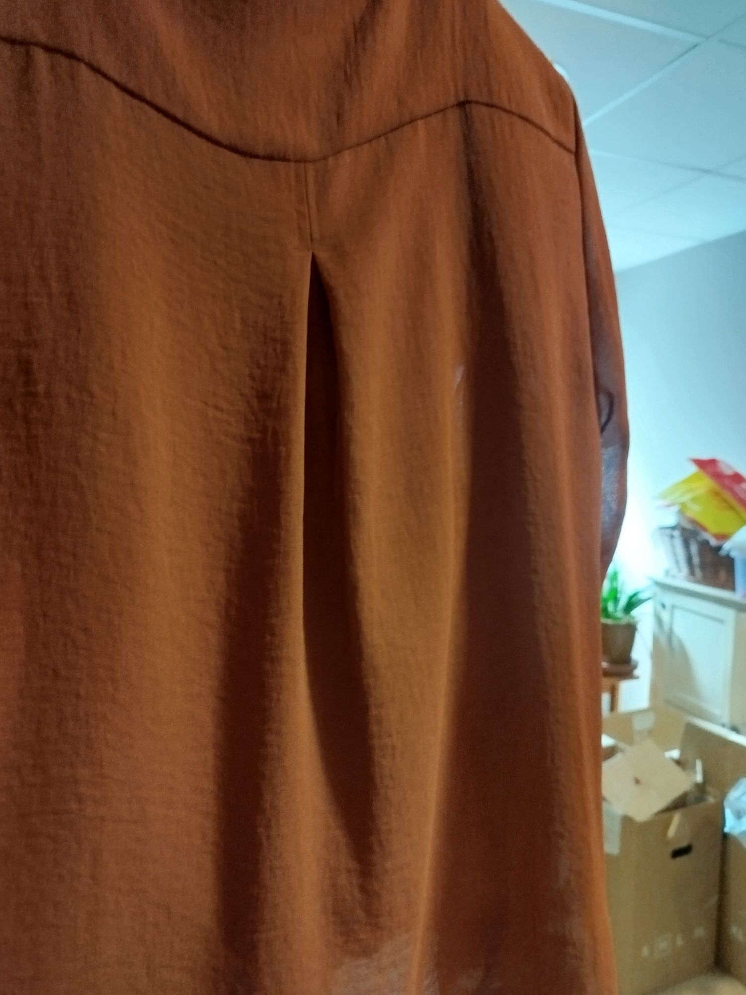 Blusa lisa comprida