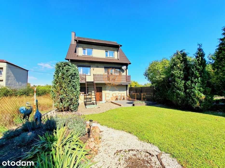 Piękny dom z ogrodem tarasem garażem. Dla rodziny.