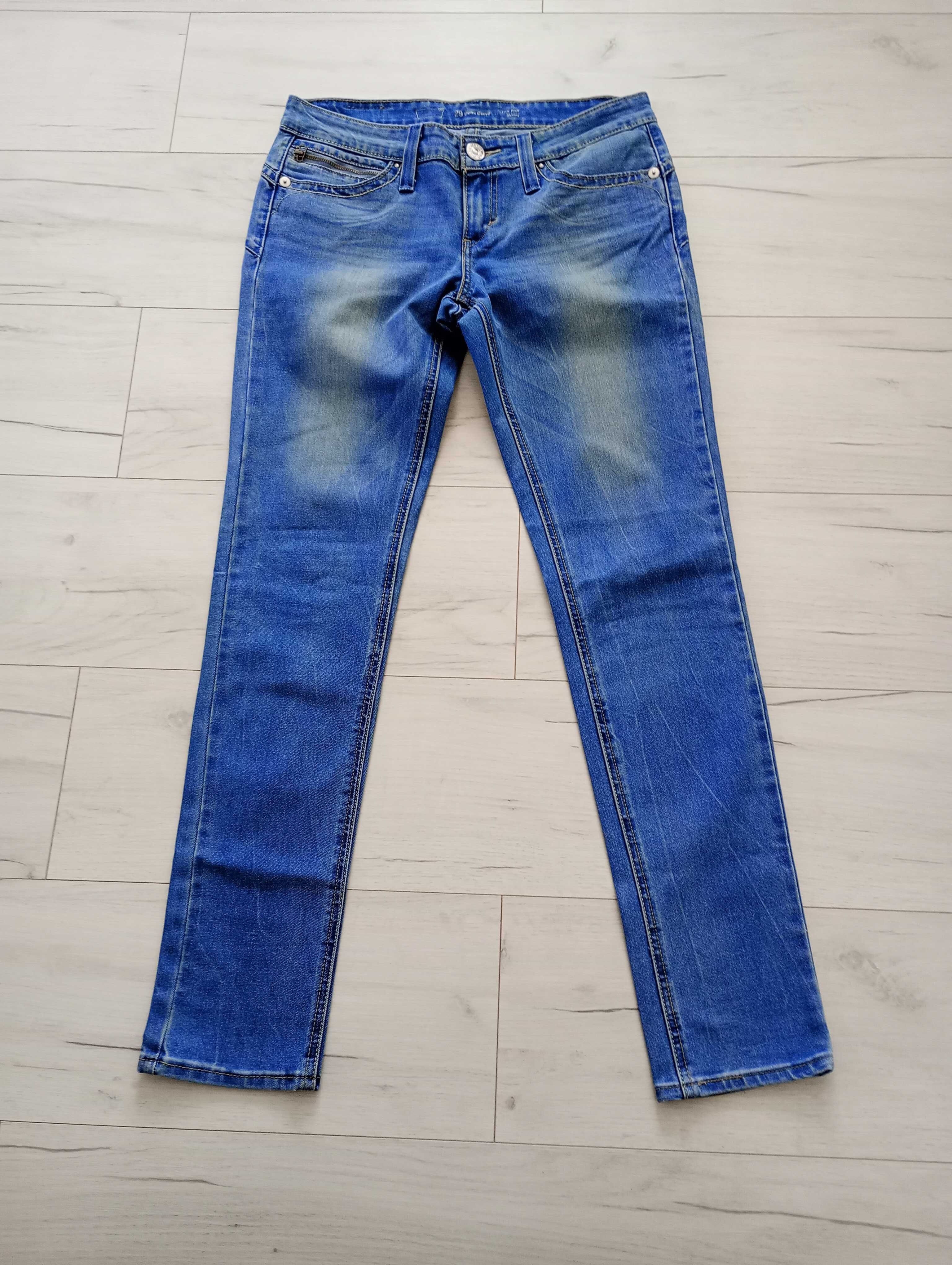 nowe damskie jeansy Levis rozm. 29/32