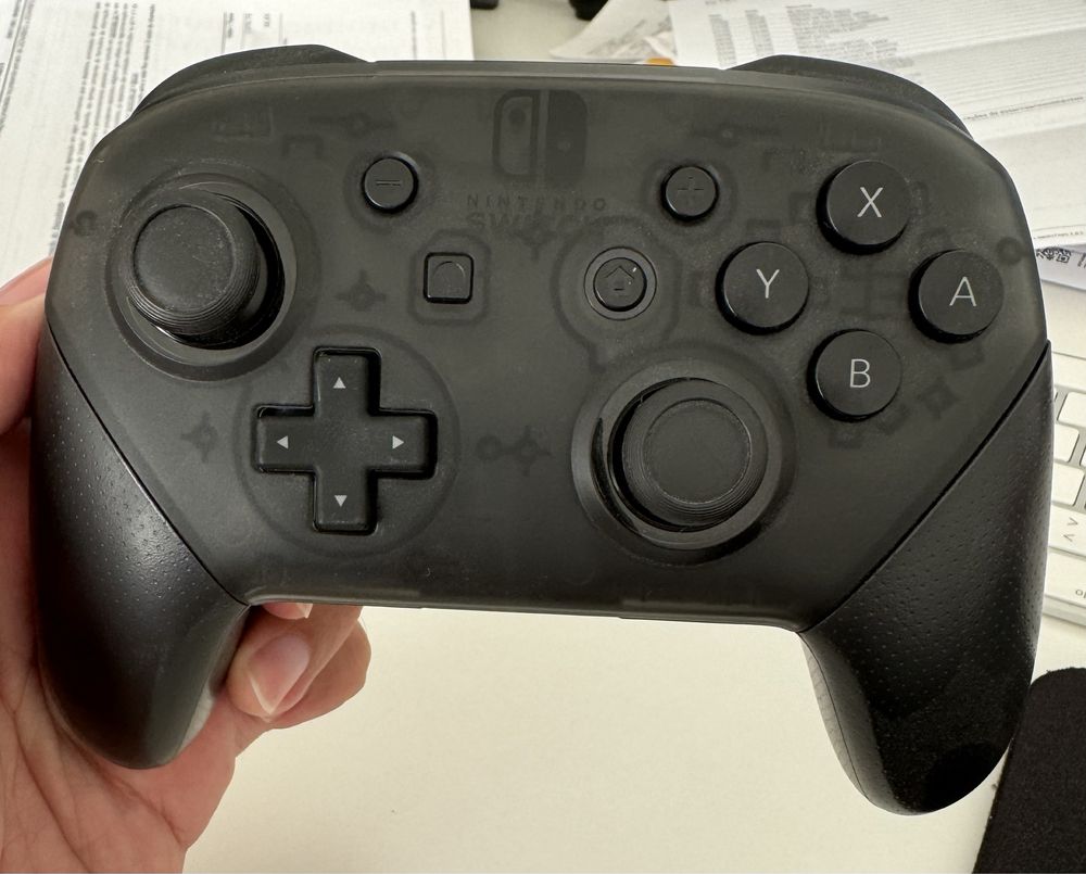 Nintendo Switch Oled + 2 comandos + 8 jogos