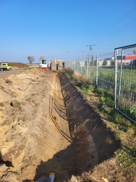 Wykopy pod fundamenty prace ziemne zasypka piaskiem