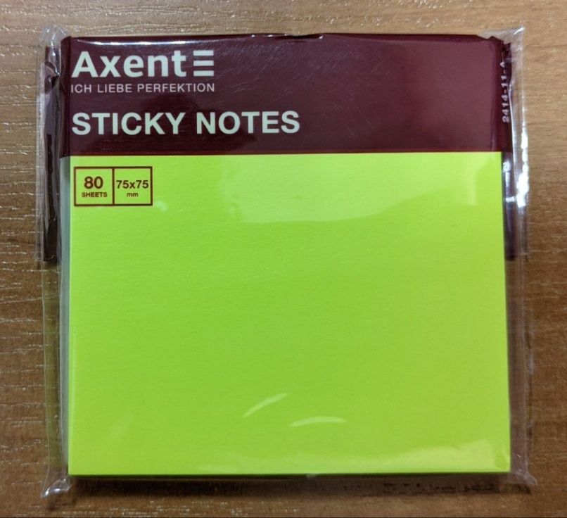 4 упаковки бумаги для записей с клейкой полоской Axent Sticky Notes.