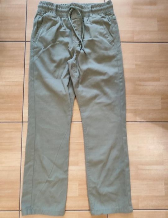 Нові джинси котонові штани хакі 134-140