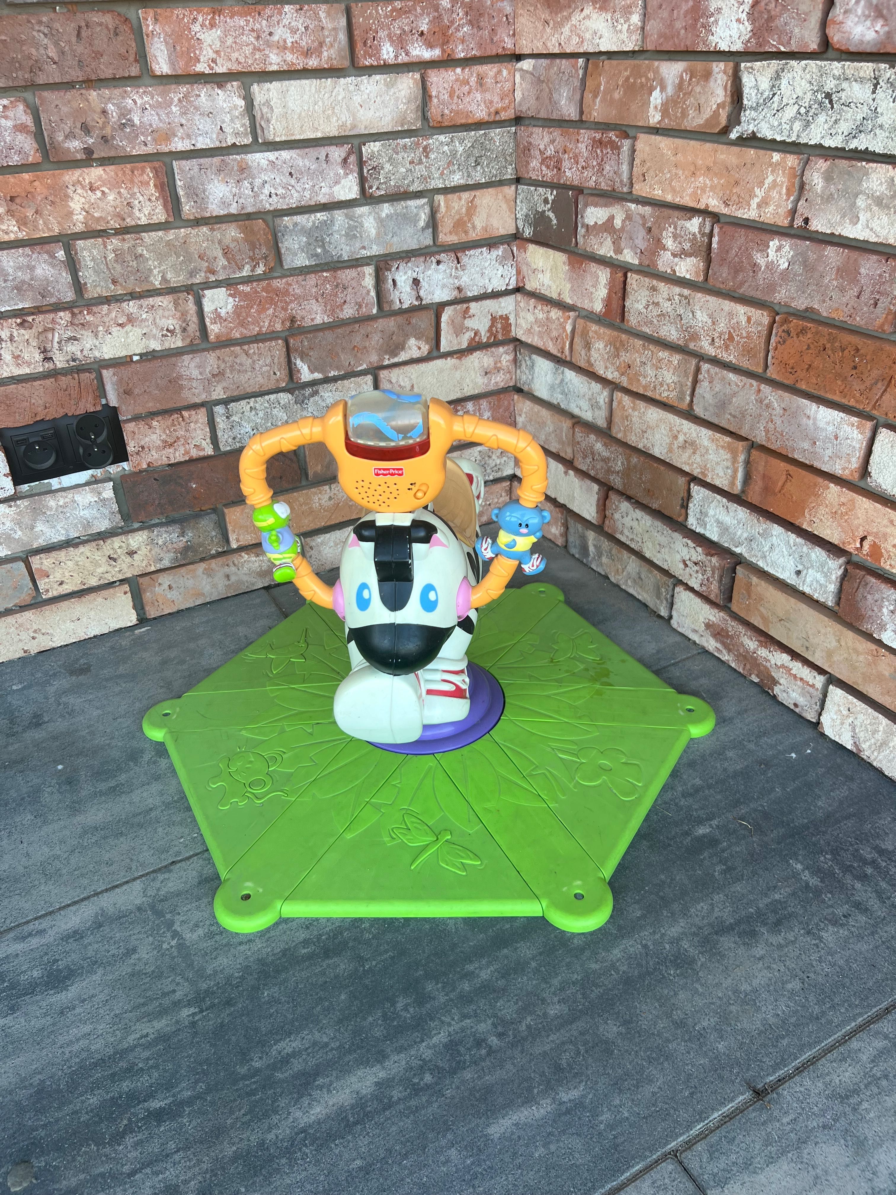 Skoczek zebra fisher price
