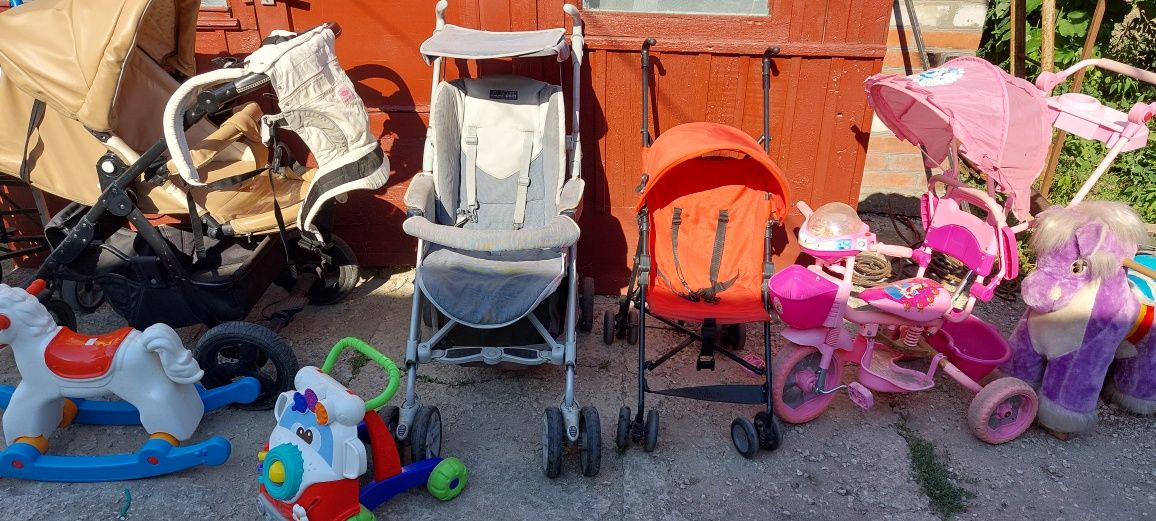 Продам детские коляски,люлька,кресло,игрушки
