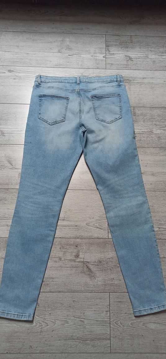 Spodnie jeansy damskie Mohito rozm. 42