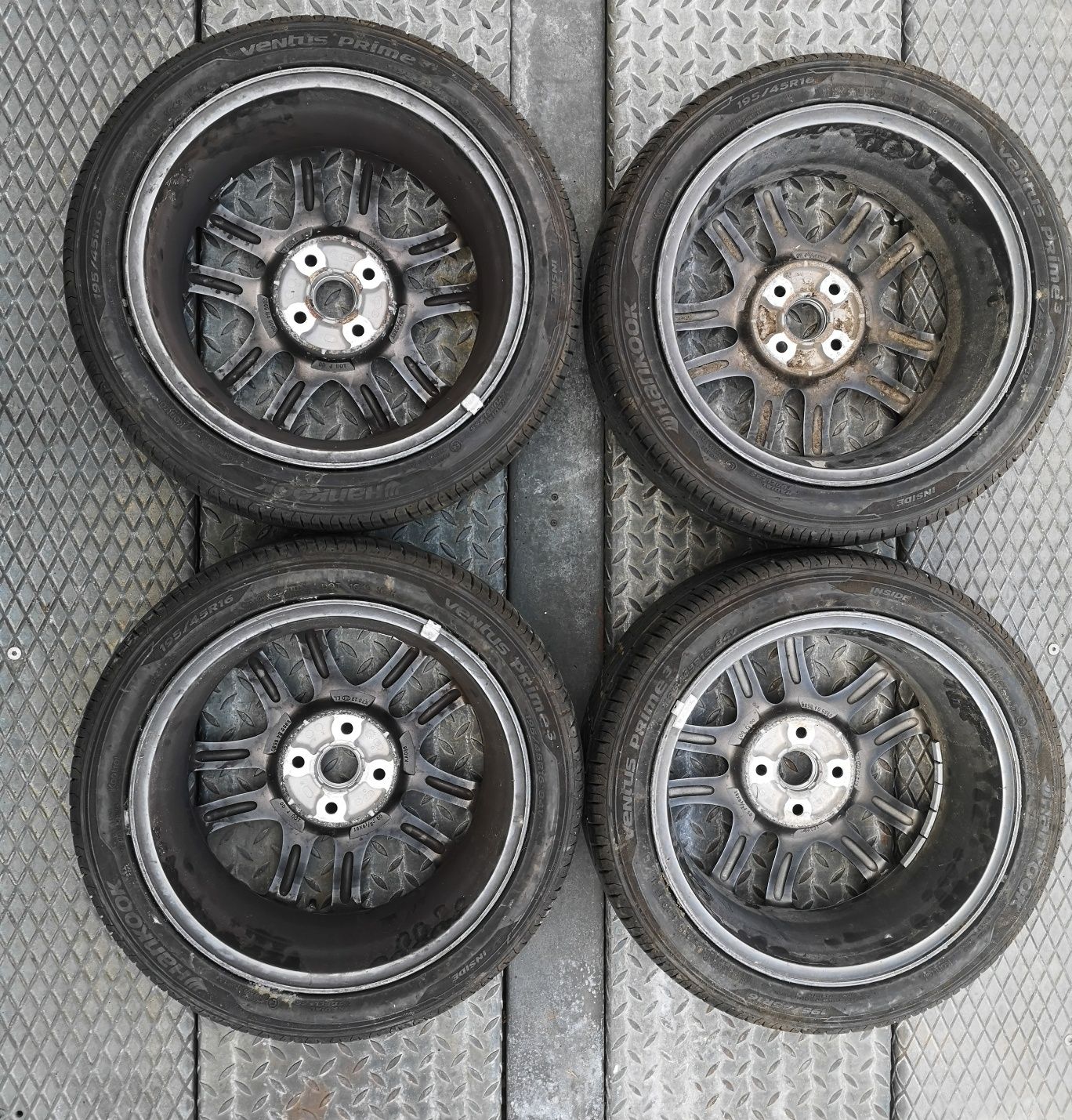 Mazda 2 felgi aluminiowe 16 koła 4x100 opony letnie Hankook 195/45r16