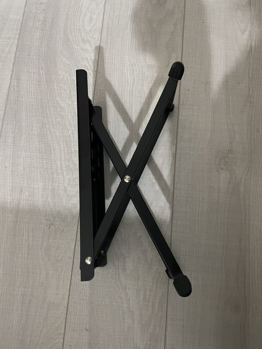 Apoio de pé para tocar guitarra