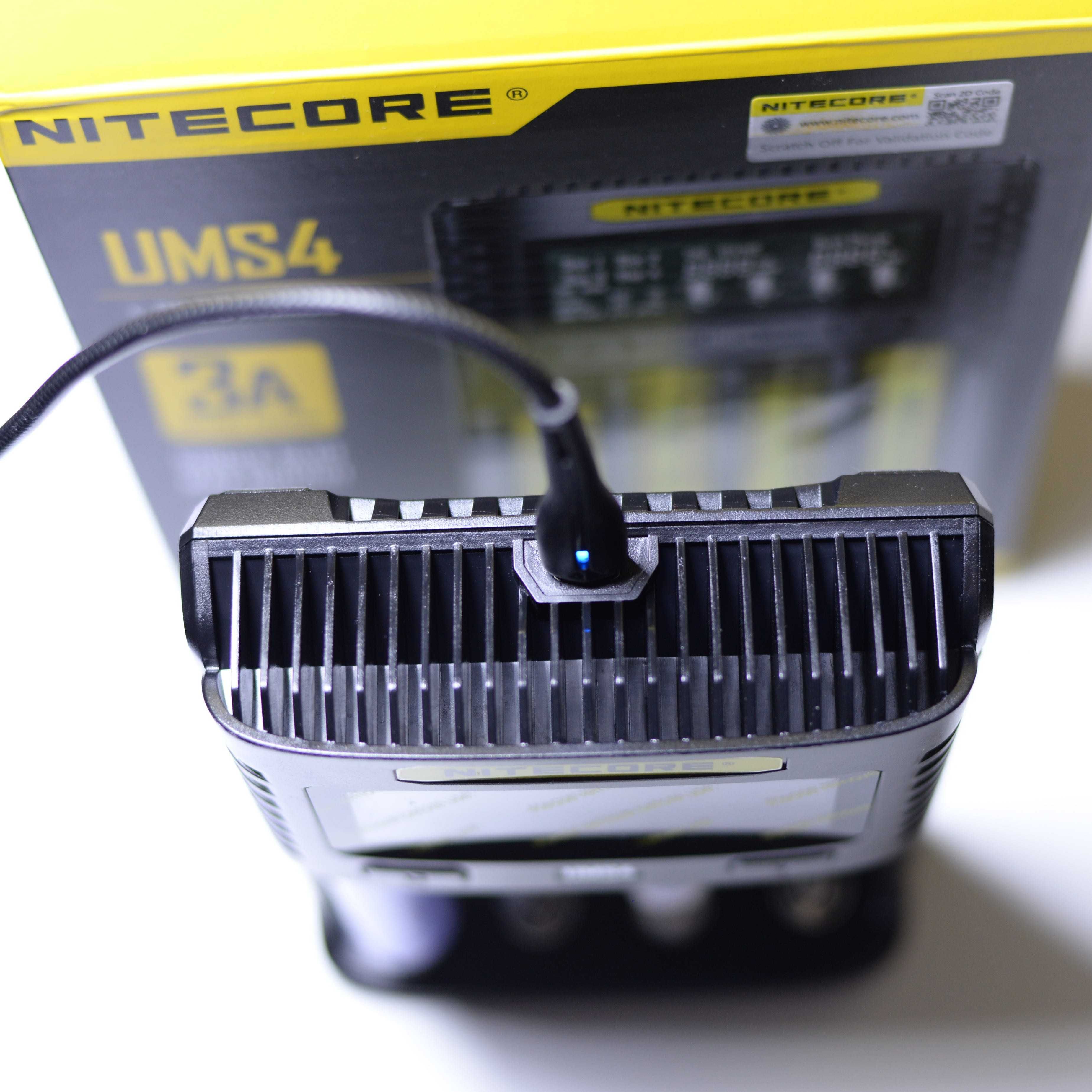 Зарядний пристрій чотирканалий Nitecore UMS4 Li-ion Ni-MH/Ni-Cd новий