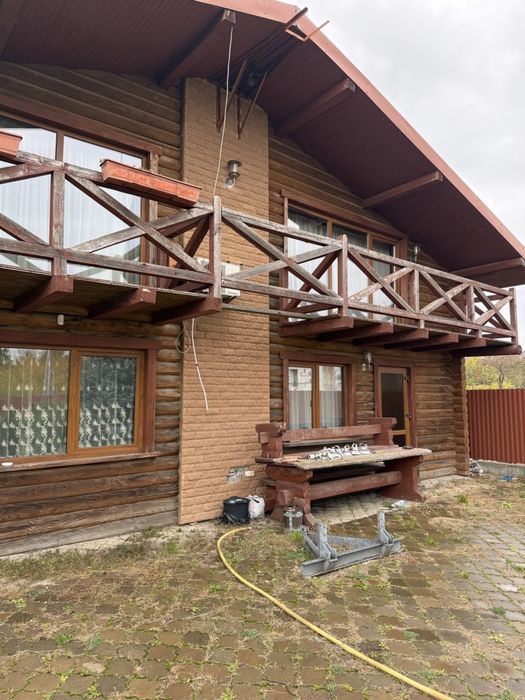 Продаж деревʼяного будинку