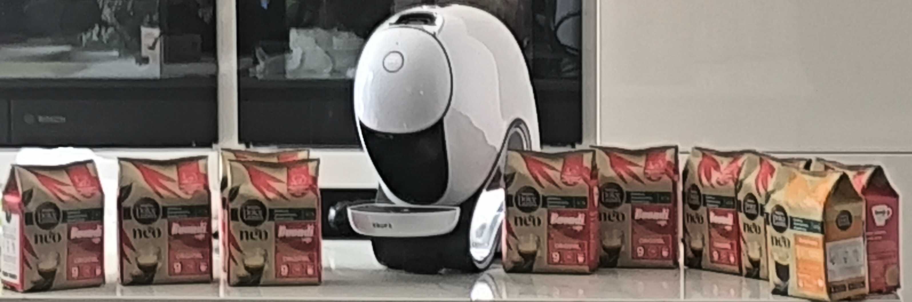 Máquina café Dolce Gusto com 10 embalagens de café.