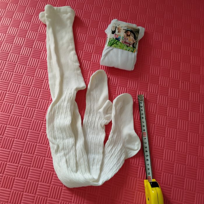 Білі колготи для дитини