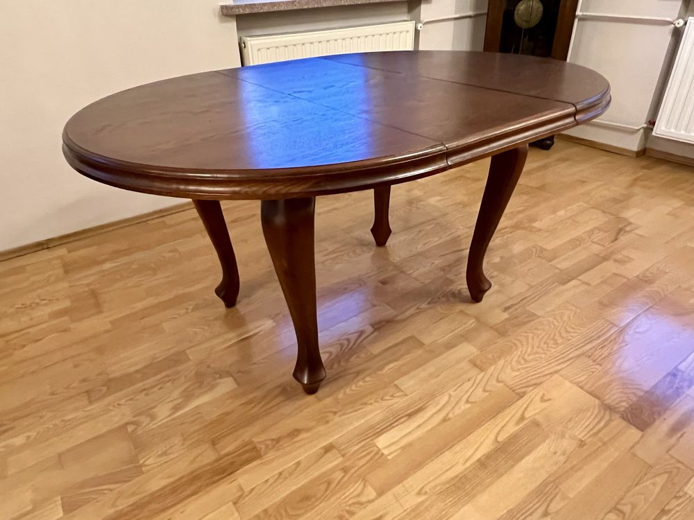 Okrągły drewniany stół do jadalni - średnica 110 cm