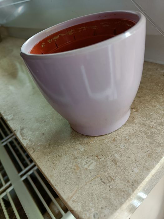 Mała osłonka na doniczkę różowa.