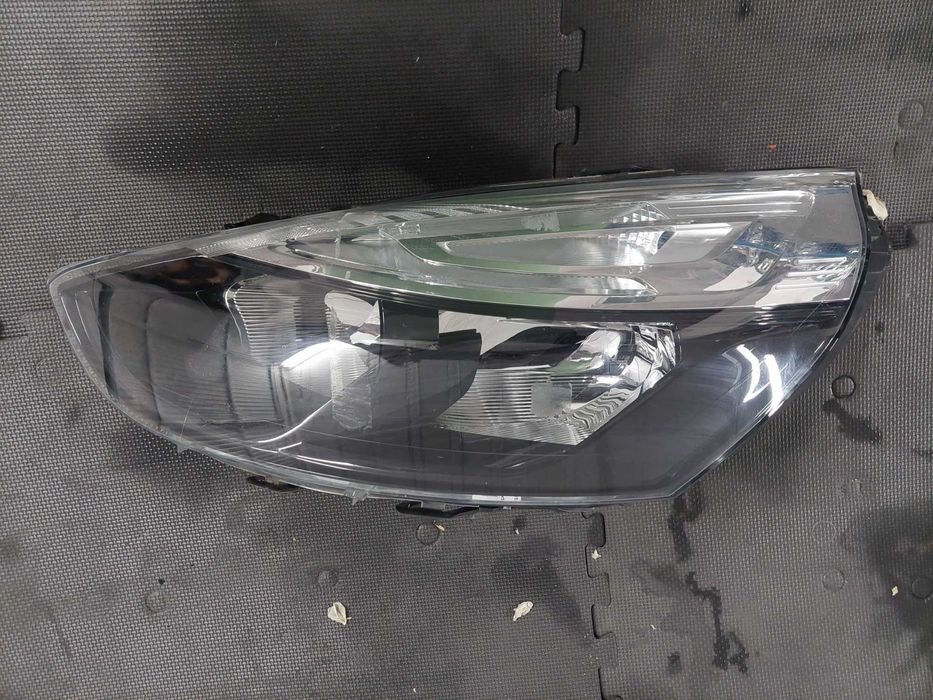 farol esq Renault Clio iv