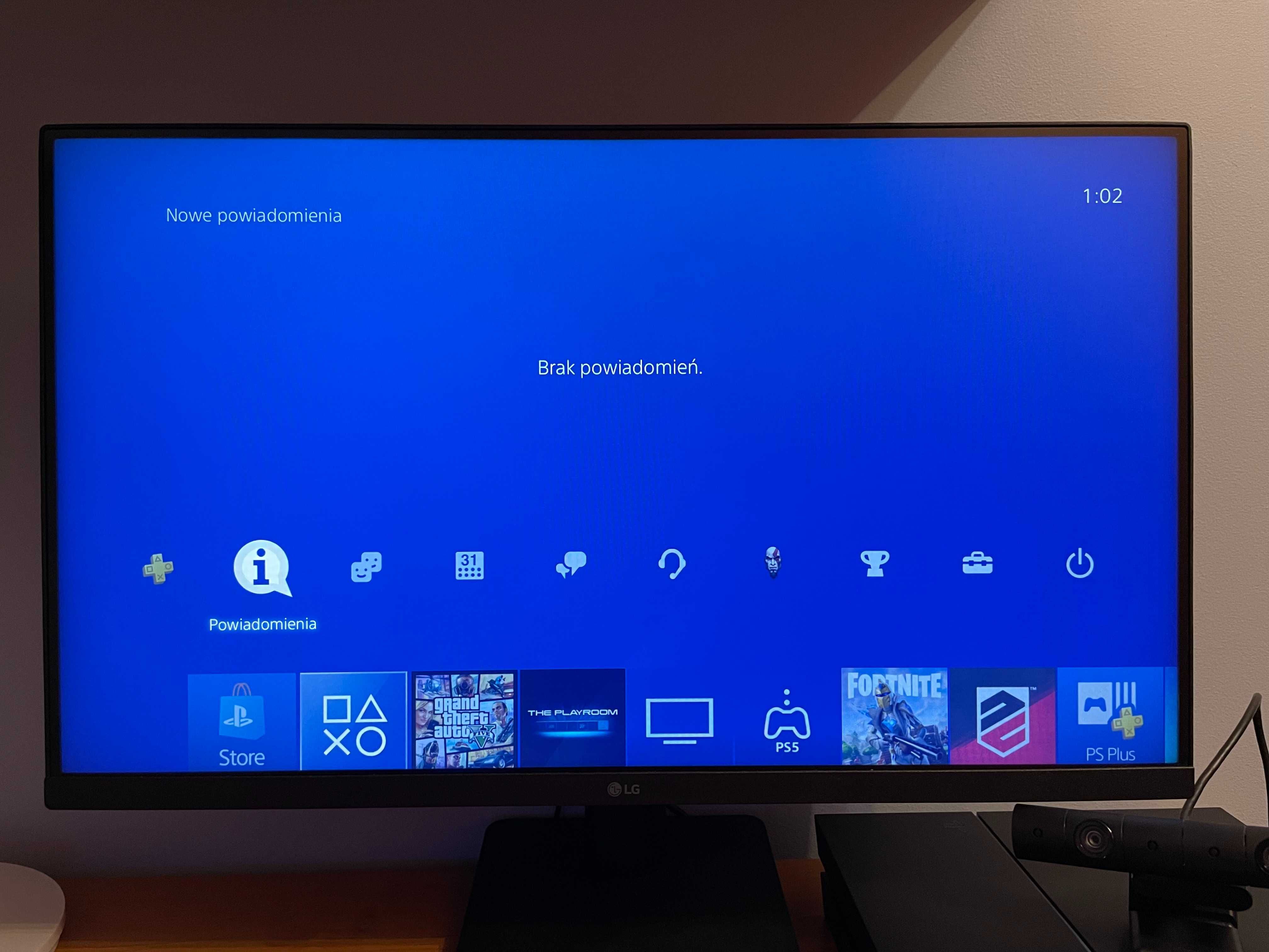 Playstation 4 + pad Dualshock 4+ kamera+5 gier + kierownica z pedałami