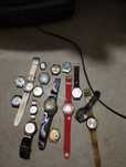 16 relógios Swatch de metal e plástico