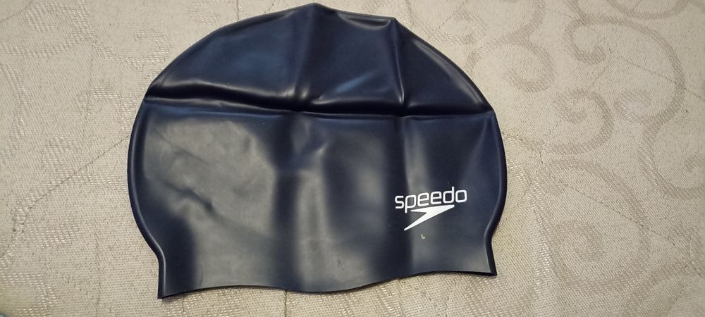Шапочки для плавання