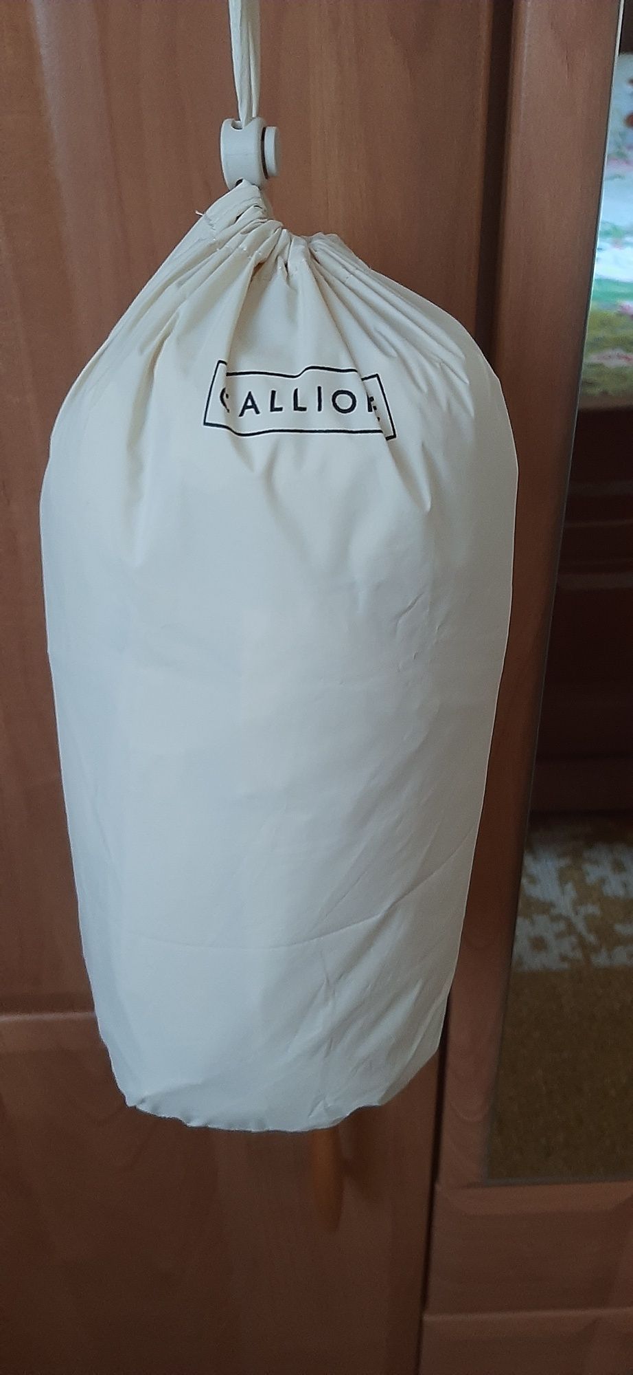 женский жилет фирмы  KALLIOPE
