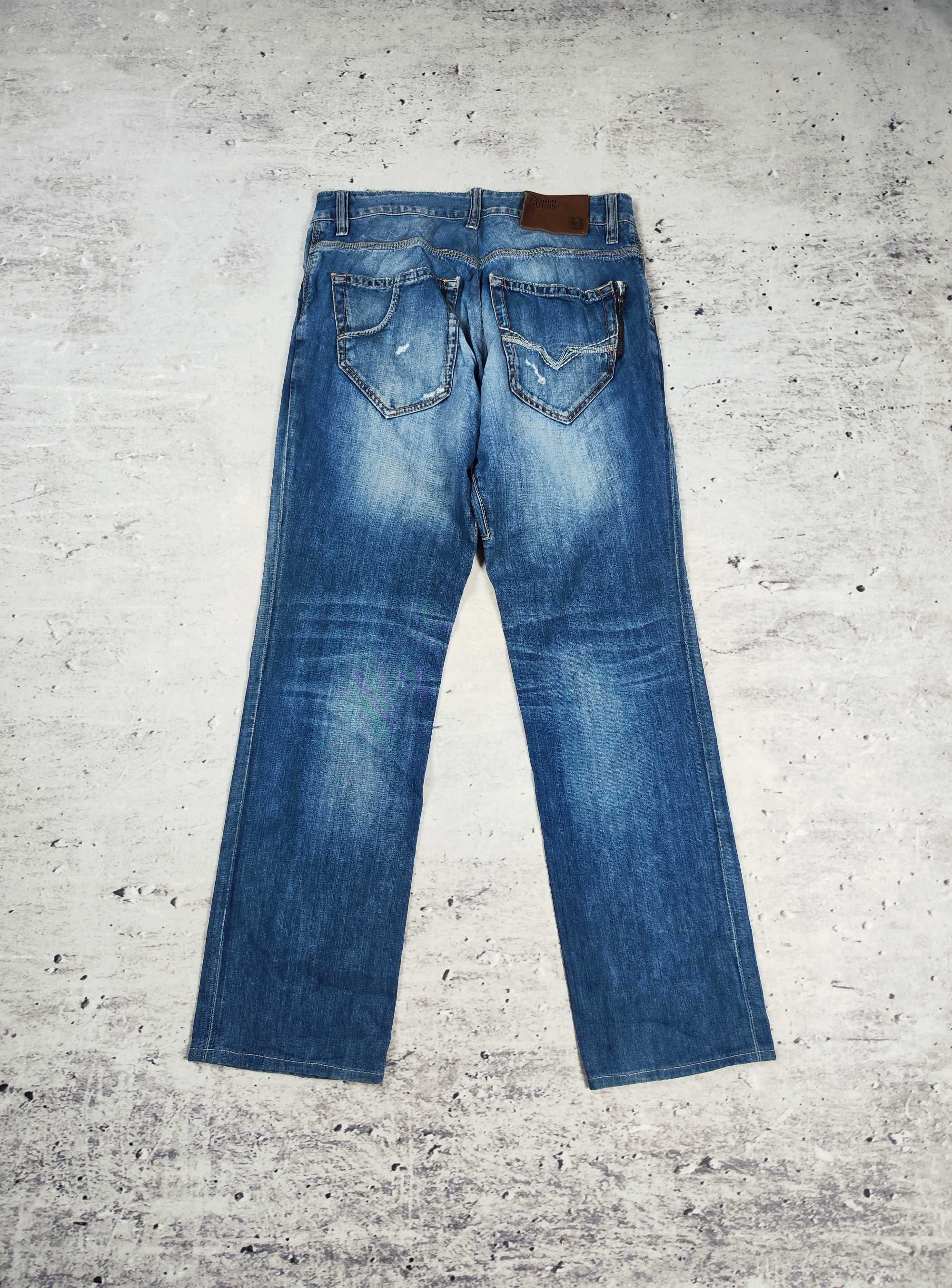 Spodnie jeansowe Guess Premium denim dżinsy męskie straight r. 33
